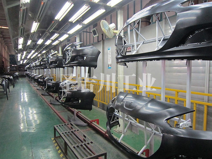Bumper reverse accumulation chain conveyor system